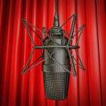 Debbie Grattan Voiceover Talent mic-against-red-background
